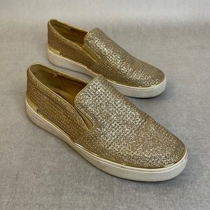 MICHAEL KORS slip on sneakers.